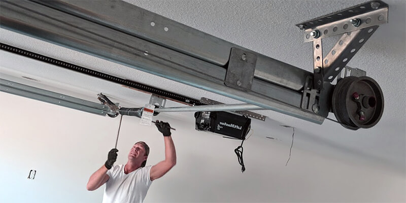 installing garage door springs - Supreme Garage Door Repair