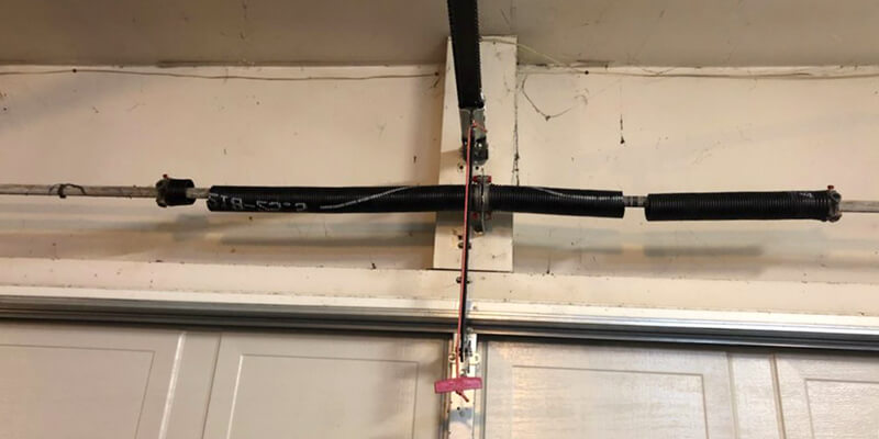 How to open a garage door with a broken spring - Supreme Garage Door Repair.