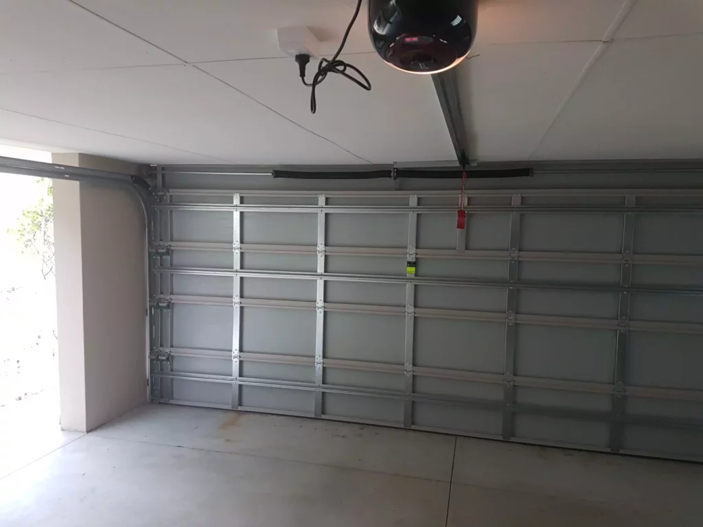 sectional garage door - supreme garage door repair